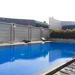 Studio Room @ Tifolia Apartment Near Kelapa Gading By Travelio